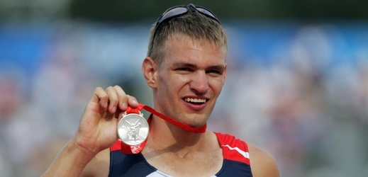Skifař Ondřej Synek se stříbrnou olympijskou medailí z Londýna.