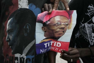Příznivci bývalého haitského prezidenta Jean-Bertranda Aristida.