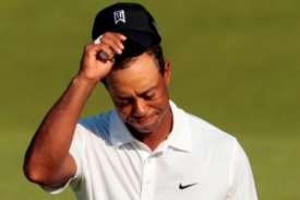 Posmutnělý Tiger Woods.