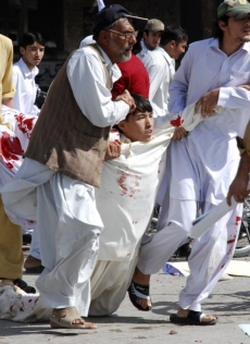 Zraněný šíitský chlapec.