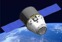 Kosmická loď Dragon by měla dopravovat náklad i posádku na ISS. 