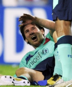 Lionel Messi v bolestech.