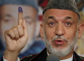 Volební megapodvodník a afghánský prezident Karzáí.