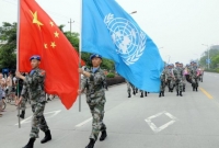 Přehlídka čínského kontingentu vojsk OSN po návratu z Dárfúru, 16. července 2010.