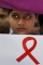 V indickém Allahábádu si připomínají boj proti zákeřné nemoci také školní děti. (Foto: ČTK/AP)