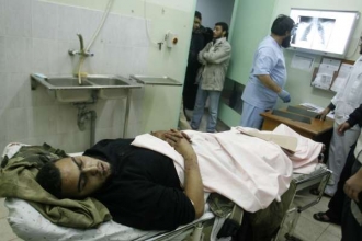 Zraněný Palestinec z výcvikového tábora Hamasu v Chán Junís.