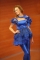 Dominika Opplová prezentuje půvabné modré šaty doplněný legínami od návrhářky Michaely Skuhravé.