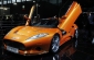 Luxusní Spyker C8 Aileron ve slušivém oranžovém provedení.