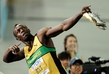 Vítězné gesto Usaina Bolta je již známé po celém světě. (Foto: ČTK)