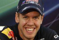 Vysmátý Sebastian Vettel.
