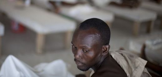 Pacient nakažený cholerou na Haiti.