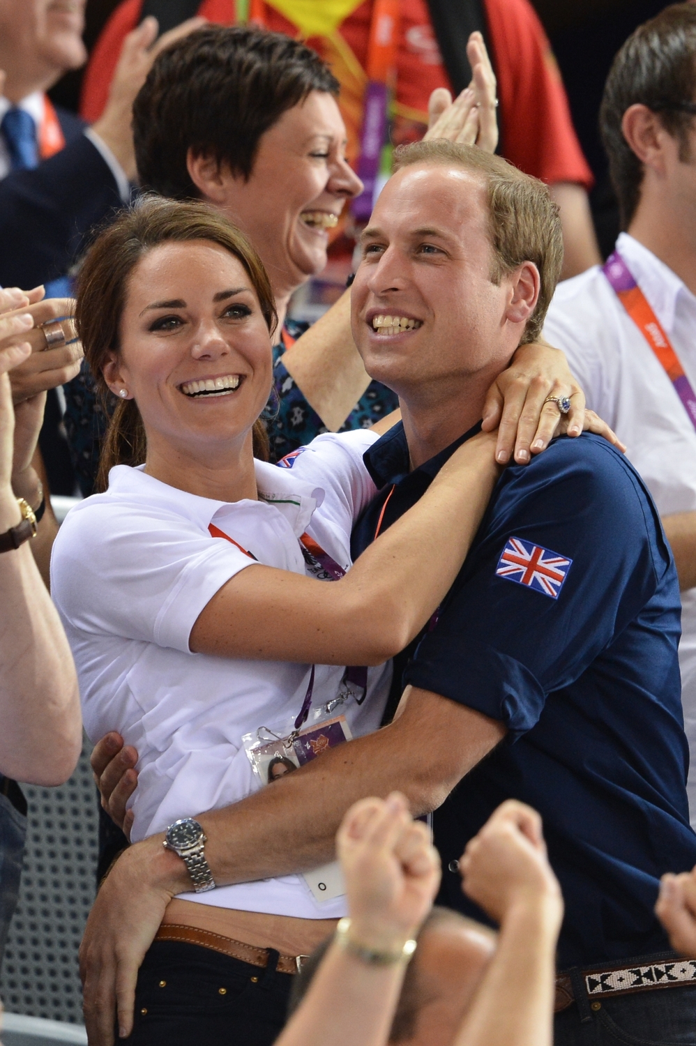 V objetí s princem Williamem na olympijských hrách na přelomu července a srpna 2012 v Londýně.