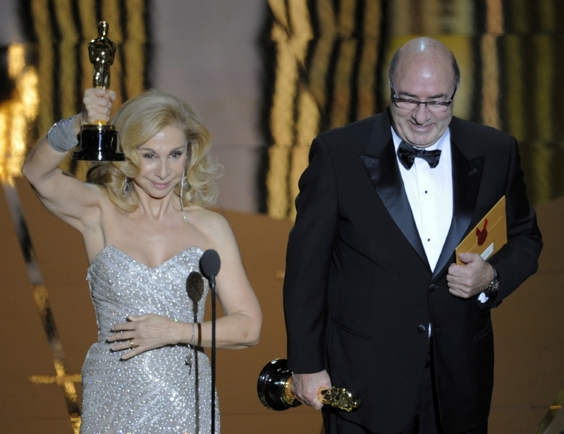 Dante Ferrettu a Francesca Lo Schiavo přebírají Oscary za režii filmu Hugo a jeho velký objev. (Foto: ČTK/AP)