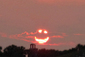Usměvavá perlička na závěr. Fotografie západu Slunce na Floridě 28. ledna 2010. (Foto: profimedia.cz)