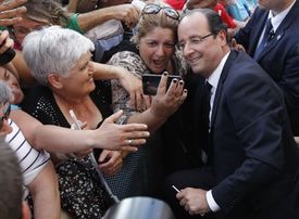 Hollande se svými příznivci v Toulouse.