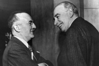 Zakladatelé Mezinárodního měnového fondu Harry Dexter a John Maynard Keynes.