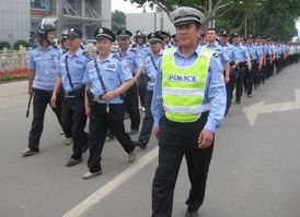 Policie nastupuje proti demonstraci v Pching Ting-šanu.