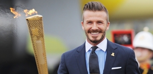 David Beckham s olympijskou pochodní.