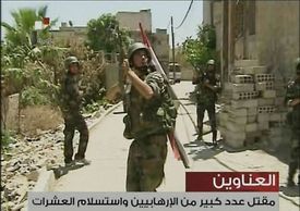 Syrští vojáci vytlačují rebely z Damašku (záběry syrské televize).