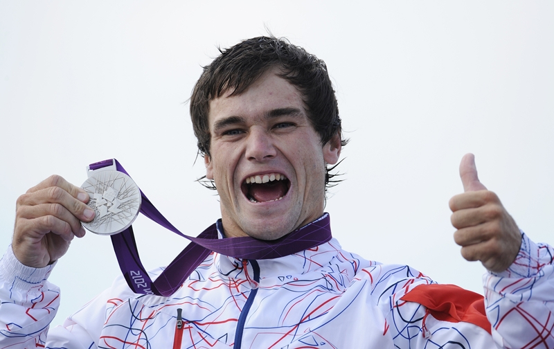 "Je to super, splnil jsem si sen," radoval se Hradilek ze své medaile. (Foto: ČTK/AP)
