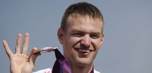Ondřej Synek se stříbrnou olympijskou medailí.