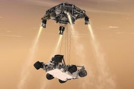 Curiosity se na povrch Marsu spustila z plošiny vybavené raketovými motory.