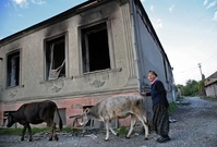 Rusko-osetinské jednotky vypalovaly domy Gruzínů i za hranicemi separatistické republiky.