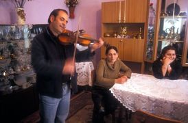 Romský houslista v Sighisoaře.
