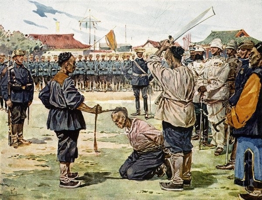 Poprava vrahů německého ministra Freiherr von Kettlera při boxerském povstání v Číně roku 1900.
