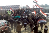 Sunnitští demonstranti v Iráku v neděli napadli místopředsedu irácké vlády Sáliha Mutlaka.