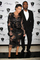 Televizní hvězda Kim Kardashianová je sice zahalená téměř až ke kotníkům, ovšem v krajkových šatech, které také nedávají příliš prostoru pro fantazii. Její přítel Kanye West (vpravo) je z ní určitě nadšený. (Foto: ČTK/PA/AJM)