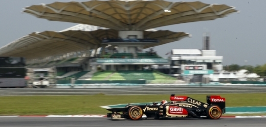 Kimi Räikkönen se svým monopostem v Malajsii.