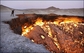 Door to Hell, Turkmenistán. V poušti Karakum se roku 1971 propadla zem a vytvořila tuto 90 metrů hlubokou jámu, z níž i po 40 letech stále uniká metan. (Foto: Amazindestinationstoday.com)