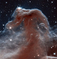 Mlhovina s názvem Koňská hlava, jejíž tvar ji připomíná. Nachází se v souhvězdí Orion, od Země je vzdálená 1600 světelných let a patří mezi nejsnáze identifikovatelné mlhoviny na obloze. (Foto: profimedia.cz)