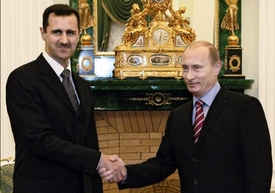 Bašár Asad (vlevo) a Vladimir Putin v roce 2006.