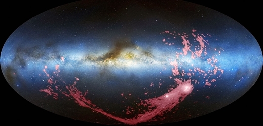 Proud plynu na obrázku vytvořeném kombinací viditelného a radiového záření. Je vyznačený růžově. Bělavé body vpravo dole jsou Magellanova mračna. Osa uprostřed značí polohu Mléčné dráhy.