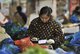 Prodavačka na trzích v Che-fej, provincie Anhui.