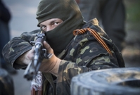 Ozbrojený separatista na Ukrajině.