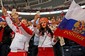 Pohledná fanynka v typicky kýčovitém ruském hávu. (Foto: ČTK)