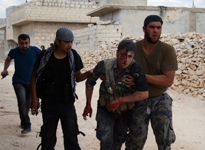 Zranění bojovníci FSA u Aleppa.