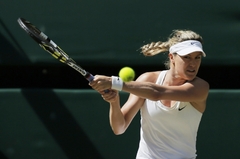 Sebevědomá Bouchardová vyhrála v loňském roce na Wimbledonu juniorskou kategorii.