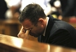 Handicapovaný sportovec Oscar Pistorius u soudu v jihoafrické Pretorii.