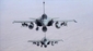 Dvě francouzské bojové stíhačky Rafale letící nad Irákem.