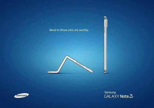 Samsung se posmívá novému iPhonu i v reklamě. Na plakátě iPhone 6 ohýbá svůj hřbet před chytrým telefonem značky Samsung.