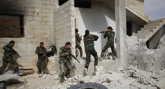 Šíitští bojovníci z Libanonu operuje po boku syrských vládních vojáků.
