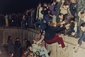 Na archivním snímku z roku 1989 jsou zachyceni obyvatelé Západního Berlína, kteří pomáhají lidem z východní části dostat se přes zeď.