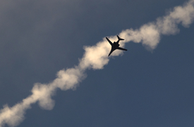Koaliční letadla se zapojila do bojů proti IS na severu Sýrie v září.