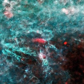 Oblast v souhvězdí Persea vyfotografovaná družicí Planck (notně zpracováno počítačem).