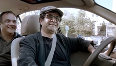 Režisér Džafar Panahí během natáčení vítězného filmu Taxi.