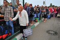 Obyvatelé Doněcka prchají před válkou do Ruska (léto 2014).